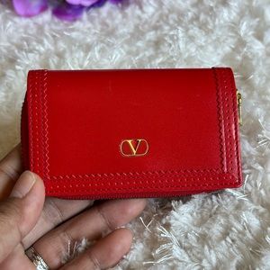 Valentino red key case.